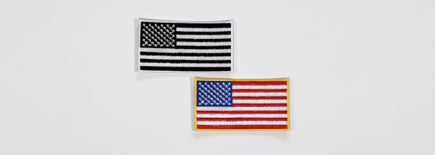 Combination of embroidered patches with the flags of the United States