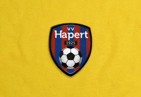 Patches with the crest of the VV Hapert football team