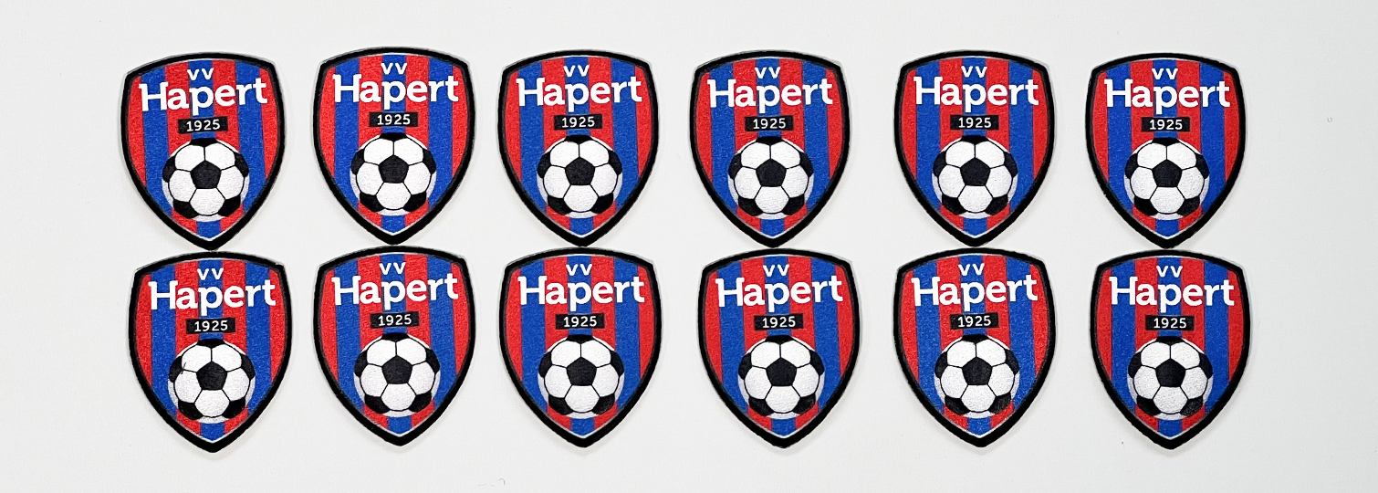 Combination of patches with the crest of the VV Hapert football team