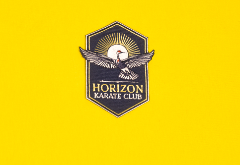 Iron-on embroidered patch for the Horizon karate club.