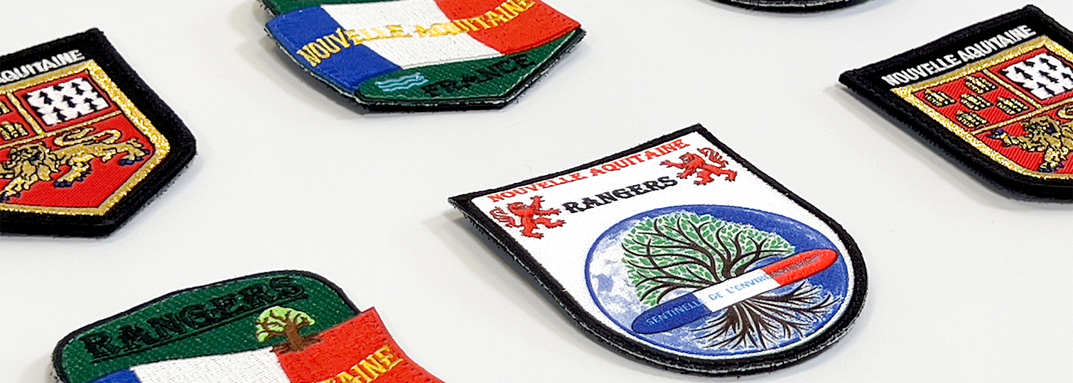 Combination of embroidered and sublimated patches for the New Aquitaine Rangers Association